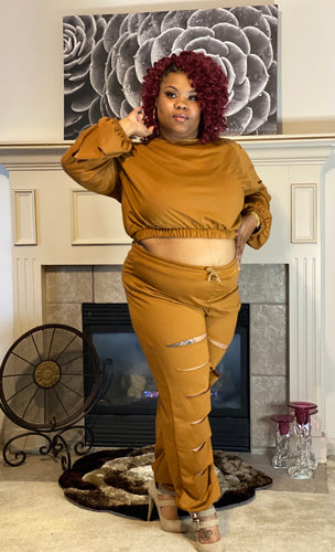 Sista/Woman: This Cut Out Pant Set is fashionable for the fall to show off your curves. Perfect outfit for a relax look, daily wear, and weekend out with the girls.  Model 2X,   Fabric Polyester 